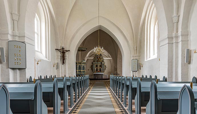 church interior of a white and grey painting