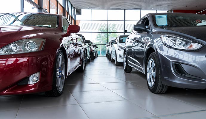 Interior of a car showroom displaying multiple cars