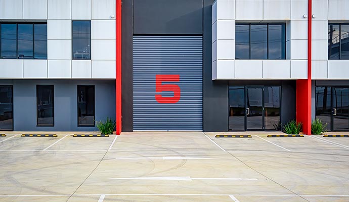Exterior view of a large industrial warehouse building Exterior view of a large industrial warehouse building