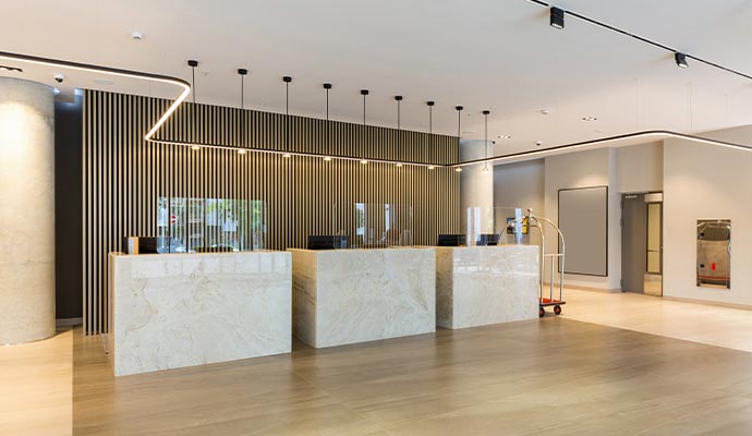Professional painting service transforming a hotel interior with a smooth finish