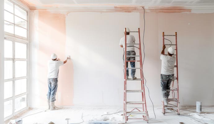 Professional team painting commercial property