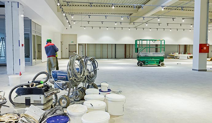 Professional Warehouse Painting Service Warehouse being painted by professional painters using specialized equipment