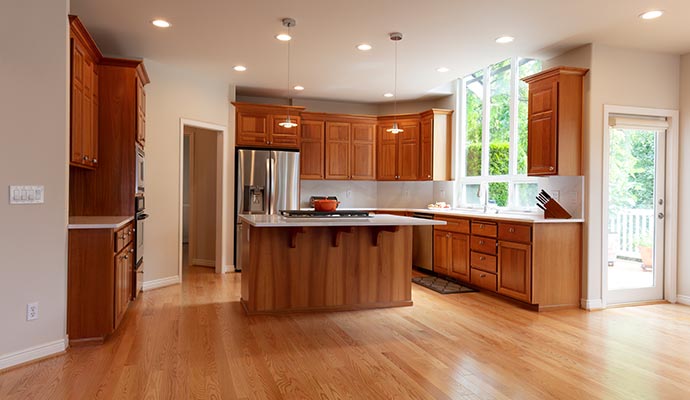 Modern kitchen area featuring elegant cabinets with durable sealant